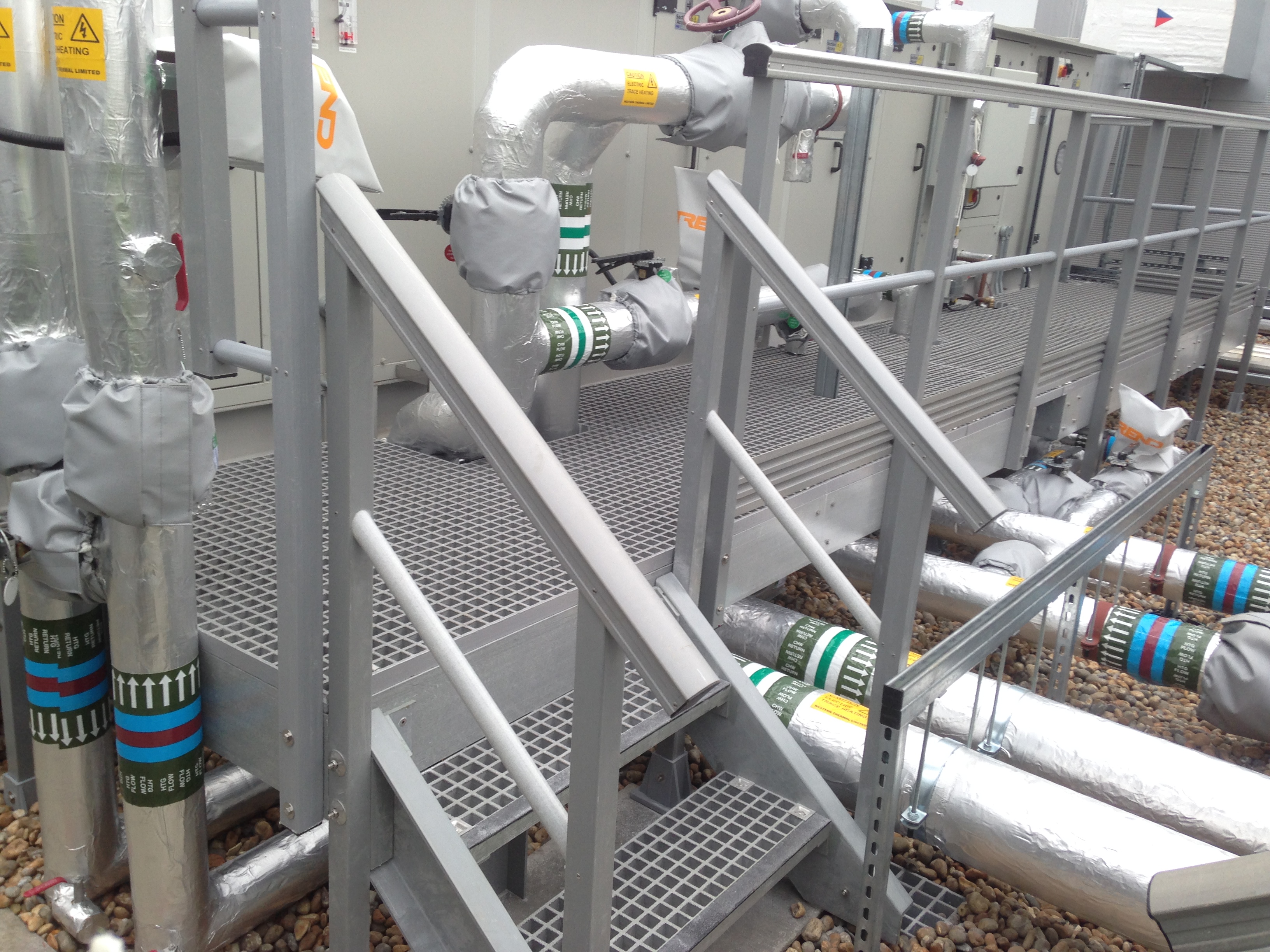 Installed GRP access platform, flooring and handrails around mechanical plant