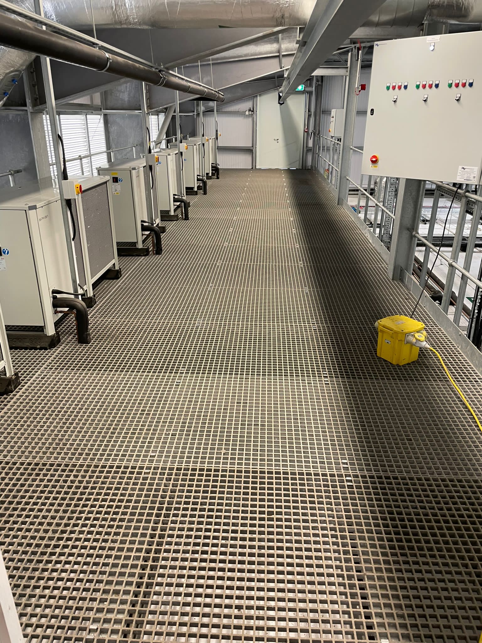 GRP grating access walkway installed around operational equipment at Immingham.